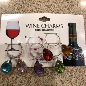 Set of six wine charms. NWT